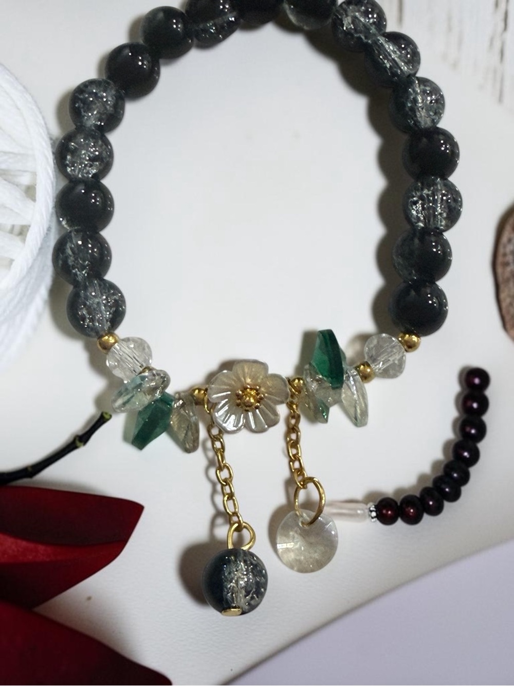 Gold-Accented Black Beaded Flower Charm Bracelet
